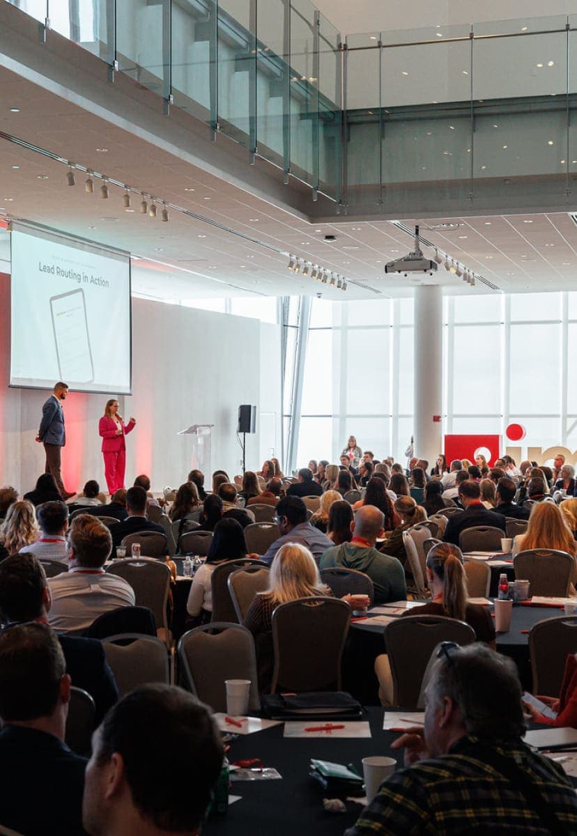 Speakers talking to a crowd