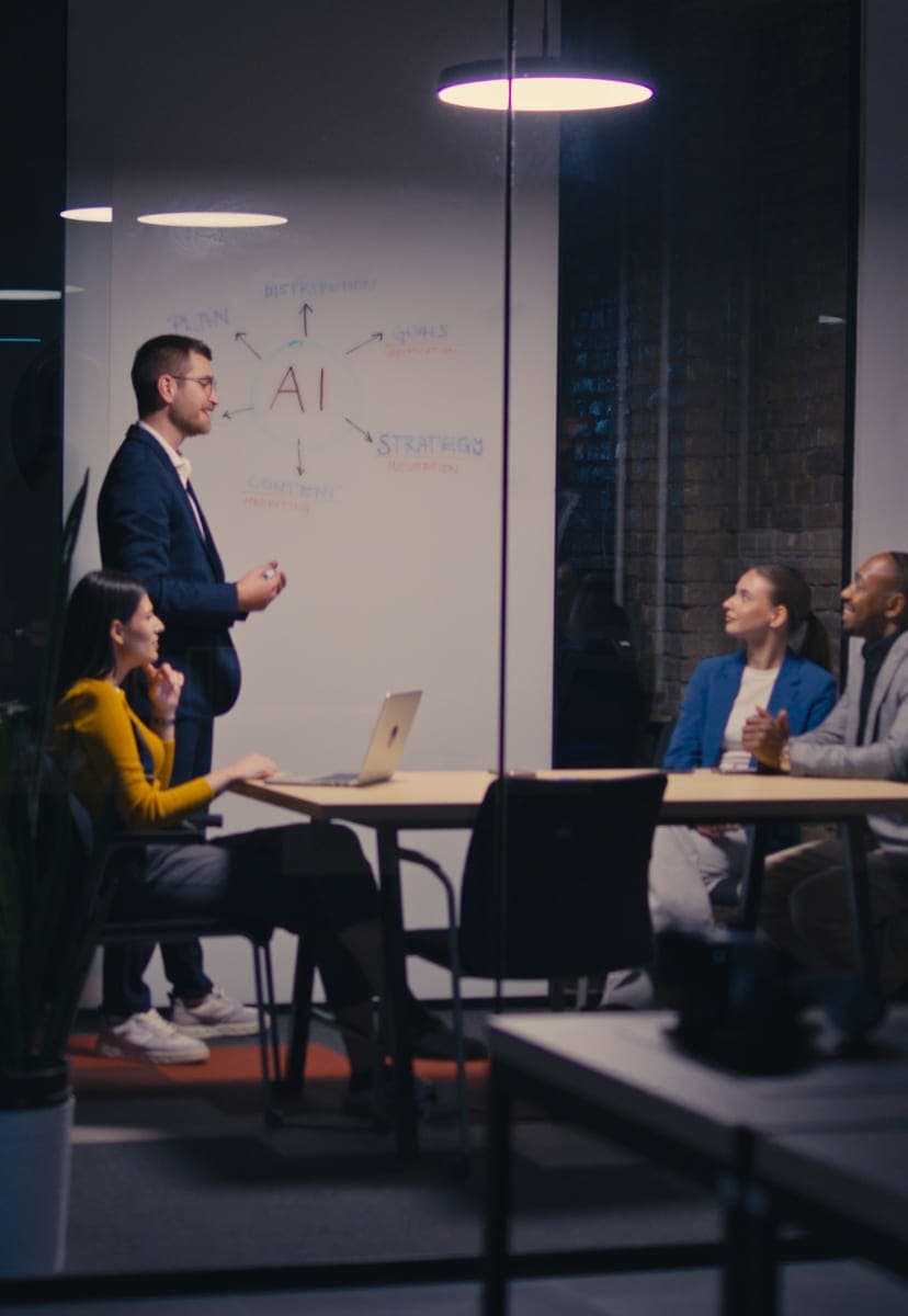 Team in a conference room around a desk