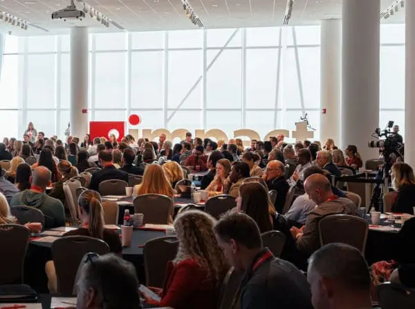 A large crowd at an Impact Networking event