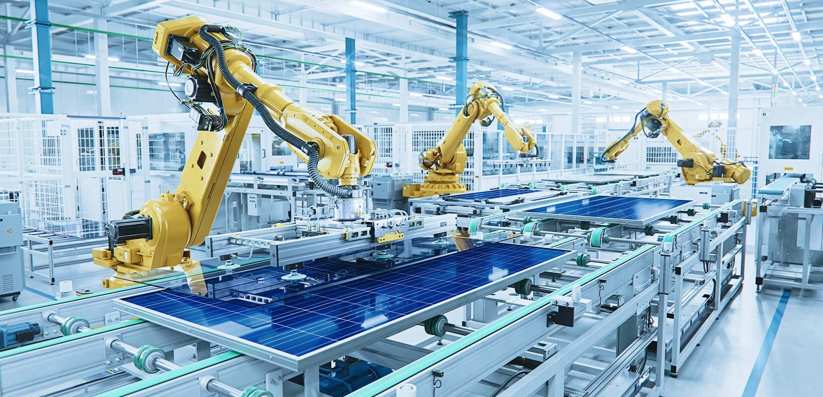 A modern manufacturing floor with yellow robotic arms working