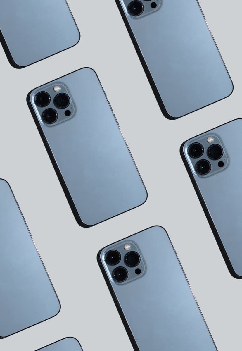A pattern of the same smartphone arranged in columns