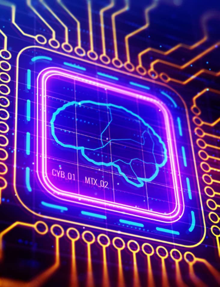 A computer chip with wires leading to a square that has the outline of a brain in it