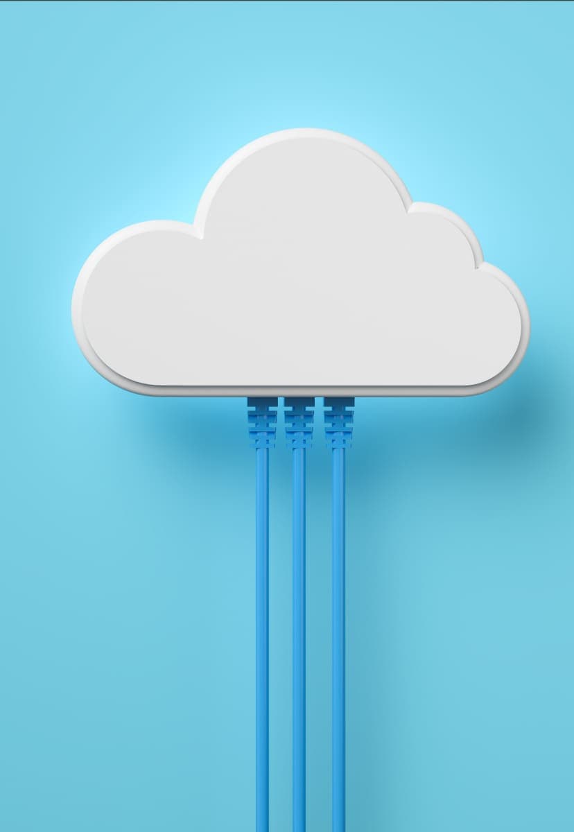 A white plastic cloud with blue wires plugged into it against a blue background