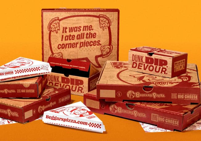 Various sizes of pizza, slice, and appetizer boxes with the Beggars Pizza branding and messaging.