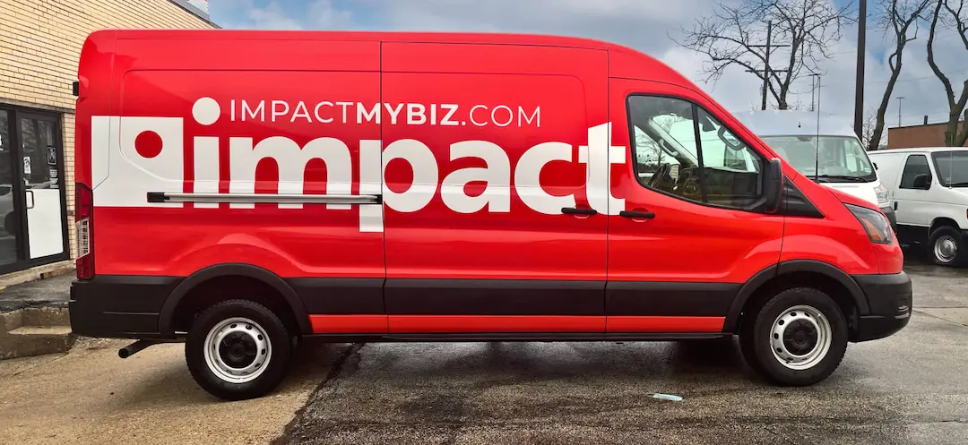 Impact's bright red van.