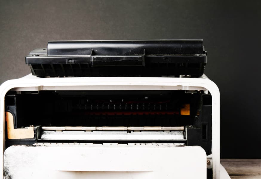 A worn down vintage printer